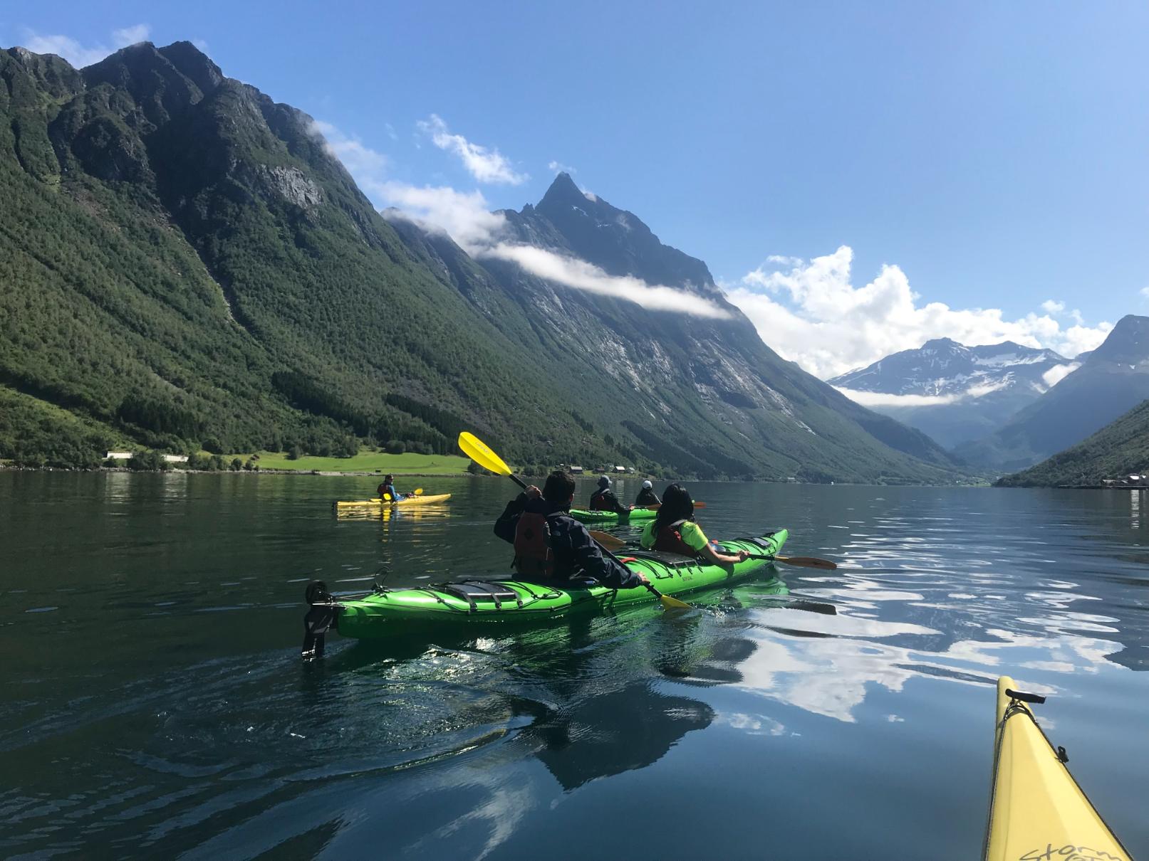 Our Forbes Featured Pick - Norway: Western Fjords Adventure 3 Day 7 Hjorundfjord kayaking Slogen in background photo Rogier van Oorschot