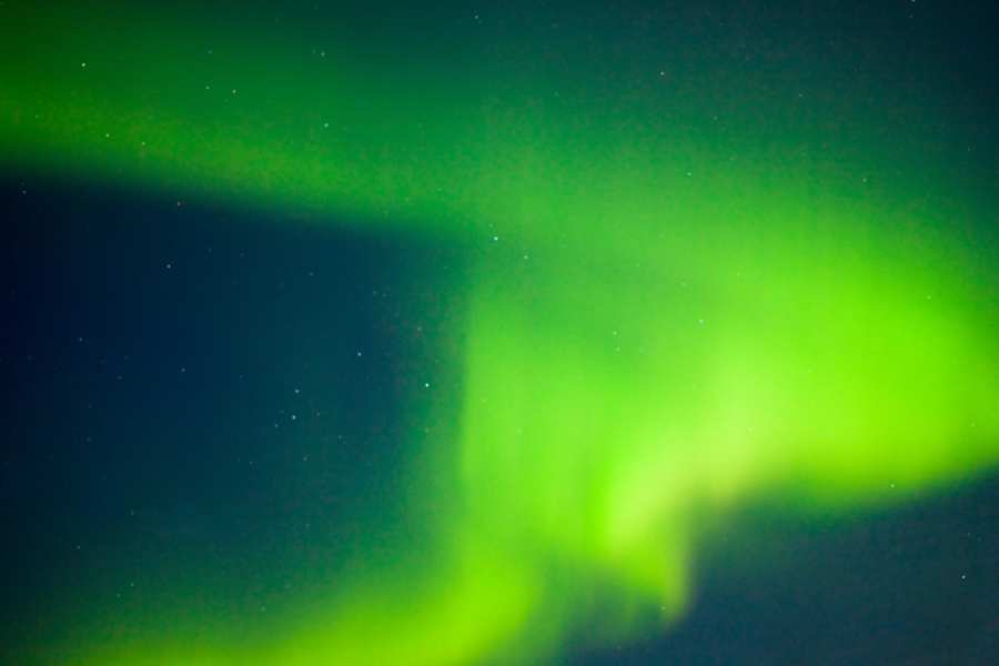 Incredible Northern Lights Viewing Across Alaska 4 Bright green aurora borealis ribbons in Alaska sky