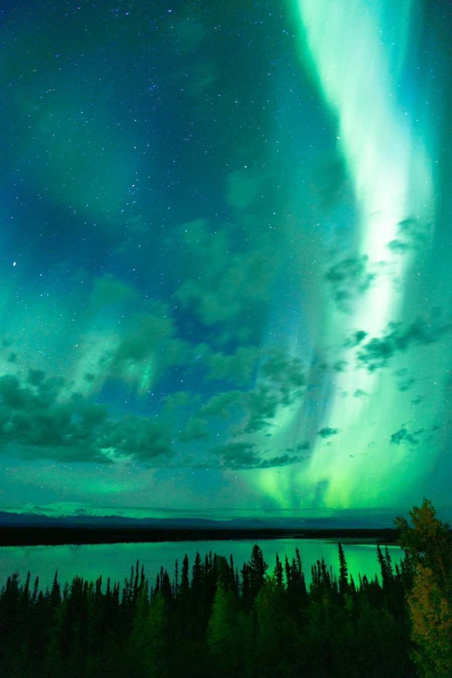 Best Aurora Borealis Viewing Spots Across Alaska 4 northern lights over lake in Alaska