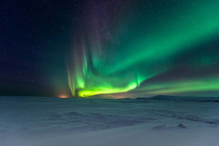 Alaska Winter Travel Packages for Adventure Seekers 3 northern lights in alaska tundra with cabin