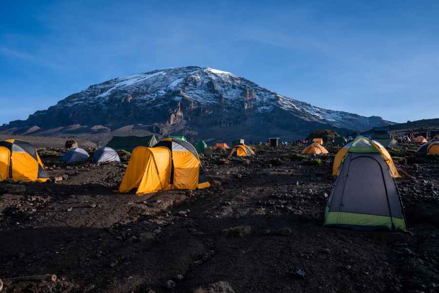 Epic Adventure Guide to Tanzania’s Mountain Landscapes 3 tents camping Mount Kilimanjaro